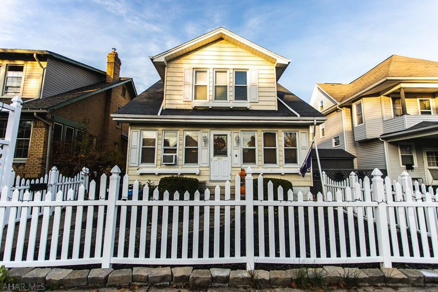 Cozy 3 bedroom, 1.5 bath house with fenced yard and detached garage. Covered back porch. Enclosed front porch. Hardwood floors in 2nd floor bedrooms. Attic storage.