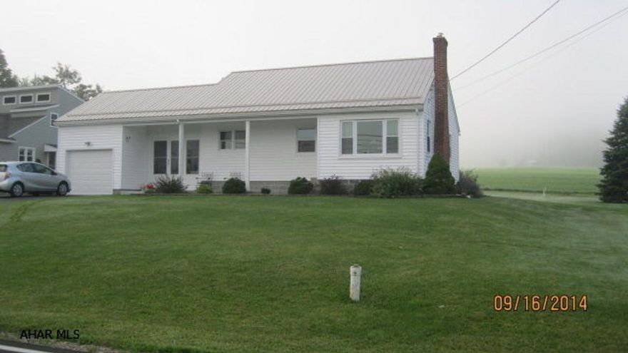 Refurbished two bedroom ranch with HW floor, Living room fireplace, and enclosed 3 season porch.  Hot water heat.