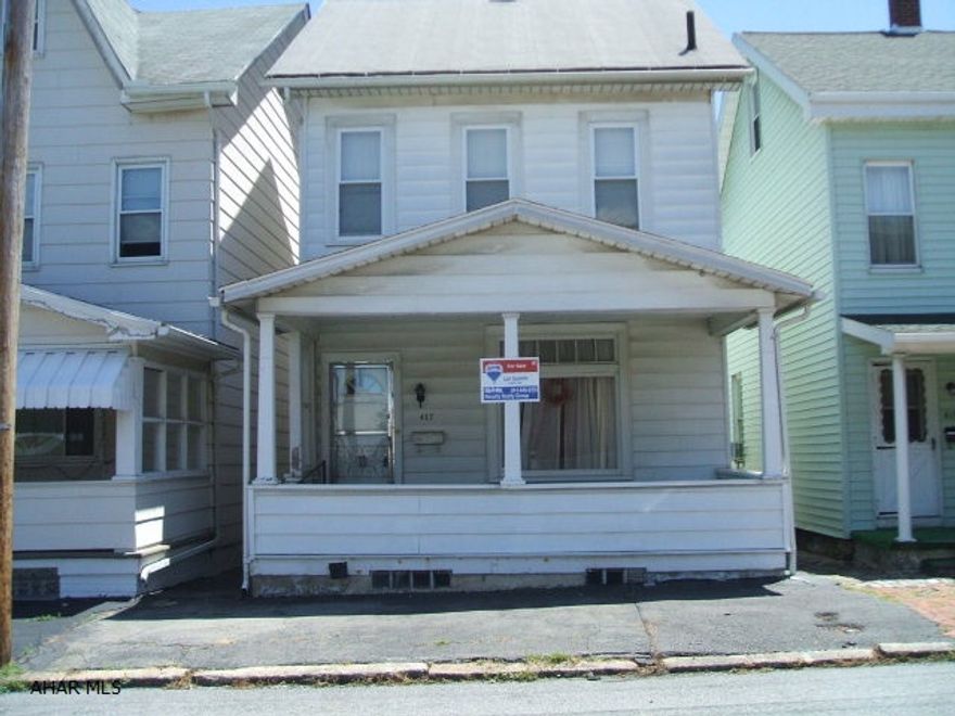 Great starter home or investment property. Large rooms, eat-in kitchen, attic could be a 4th bedroom, hardwood under carpet, fenced yard.