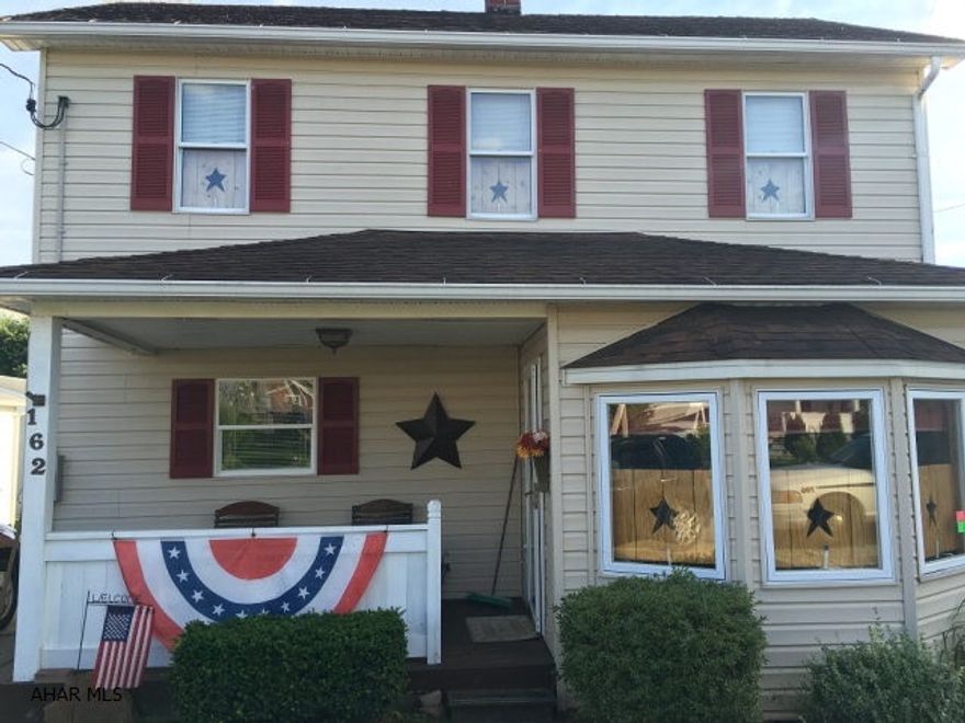 Large 5 BR, 2 1/2 bath vinyl sided home on private lot. Large covered rear deck. Self feed hard coal Alaska furnace with oil FA backup. Propane fireplace. Large eat-on kitchen. Move-in condition!