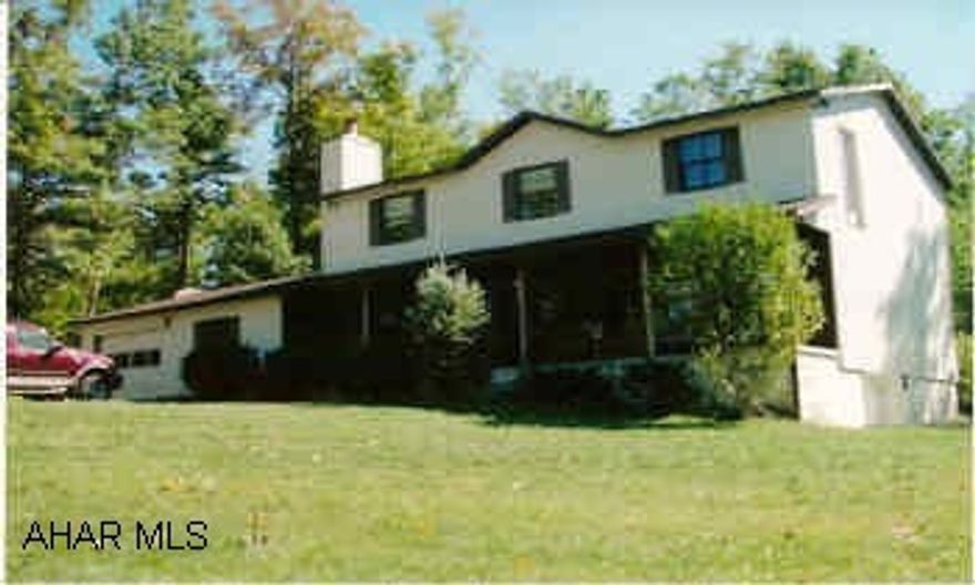 2-story 4BR/2.5BA, main level luandry, 1 car integral garage, on 5.41 acres, private setting, wooded lot.