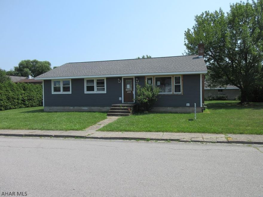 Duncansville Borough vinyl 1 story home with detached concrete block 2 car garage. Just a few blocks from Duncansville park. Nice eat-in kitchen, large formal living room, 2 bedrooms and full bath on first floor. Nice, level back yard. Loads of possibilities. AS-IS sale, seller will make no repairs.
