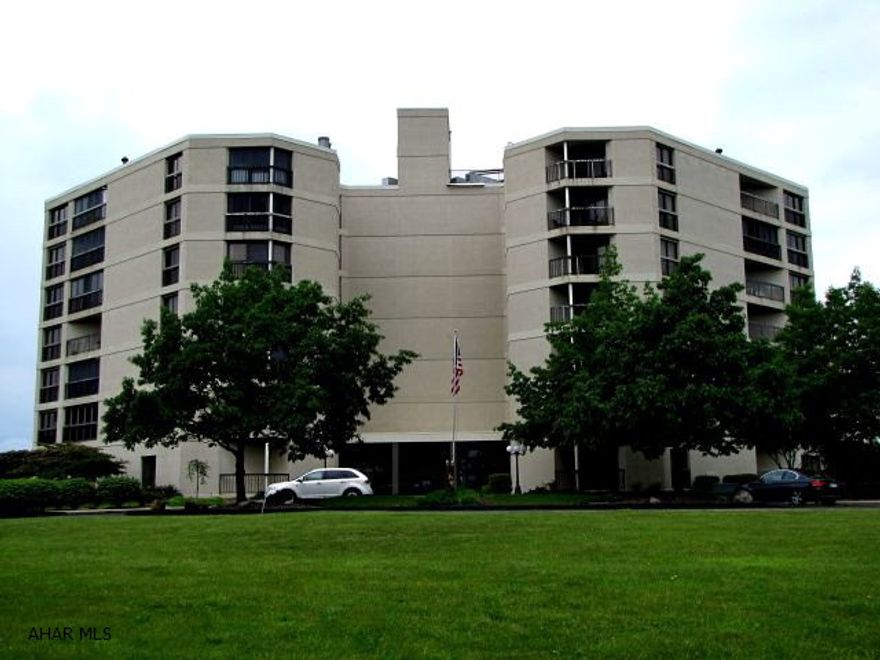 One-story living in this very spacious Park View Condo. Large corner unit with 3 balconies, great views overlooking Park Hills Country Club and Golf Course.  Garage parking, storage unit, security system, common patio, social room, library, and exercise room.  Association fee includes water, trash removal, and outside maintenance.  This is also a fire-proof building.