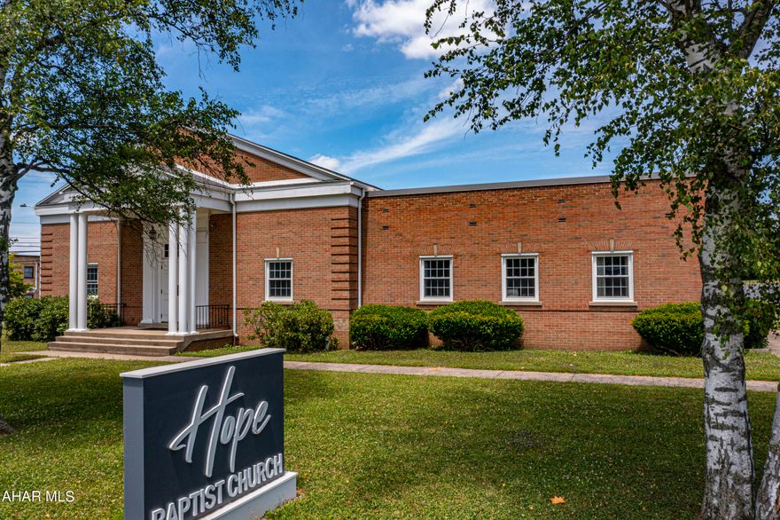 Munti-use building in a phenomenal location, previously used as Masonic Lodge. This building has over 6,000 square feet, including a worship area, recreational room, office space, large kitchen and play area. The possibilities are endless. Dont miss the opportunity to call this building yours!