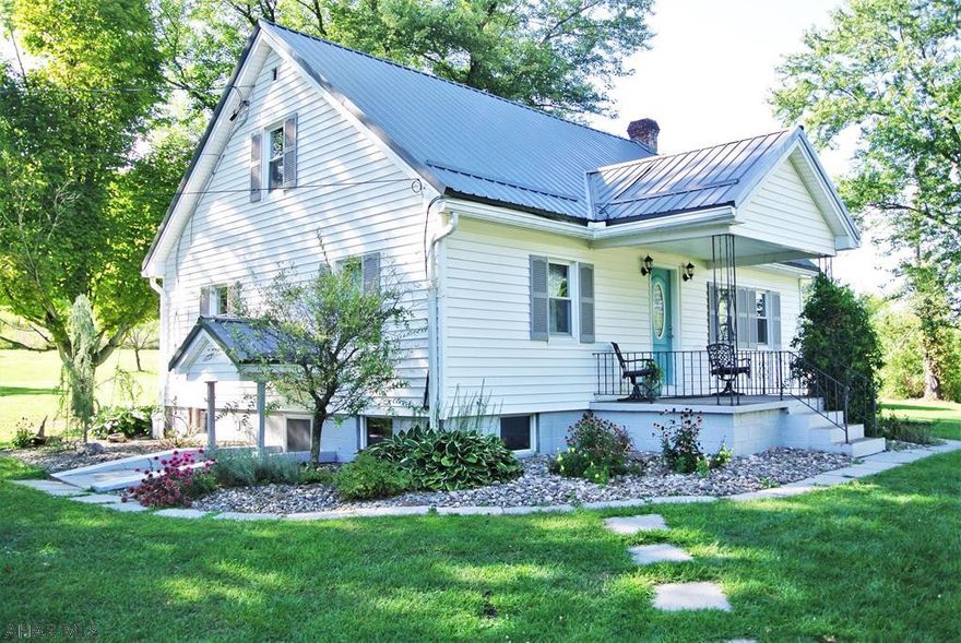 Exceptionally Beautiful Cape Cod style home in the Spring Cove School dist.   The 4 bed home has been tastefully remodeled from top to bottom. It offers, a gorgeous new kitchen w/ a solid surface countertop, New Bamboo Flooring, New tile, new bath with large soaking Tub, Fingerprint less SS appliances, new fixtures, paint, trim and New Metal Roof.    You are move-in ready for many years to come.   This darling home also sets on a large .77 acre parcel with some breath taking landscaping.  Entertain your guest with the outdoor areas , firepits, and covered porch areas.  What a great home!