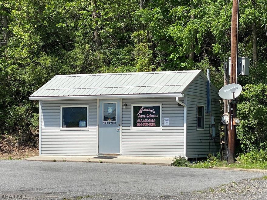 Great Location on BUsiness 220. now a profitable car lot.  Use your imagination. Close to the interchange PA turnpike & I99.  Gentleman is retiring and ready to sell. City water and sewer available.