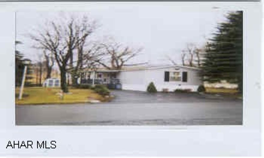 Lot RentLow Maintenance, Low Utilities, 1995 Skyline 14x76, Mint Condition, Well Maintained, Shingle Roof, Central Air, Shed, Macadem, Private Back Yard.