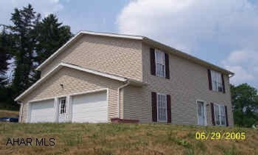 Nearly new home with a view. Close to town.