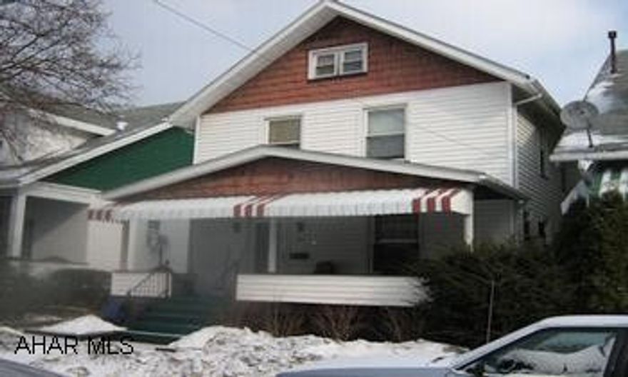 Cute two story home with newer vinyl siding and windows.  Roof 10 yrs.  Remodeled kitchen.