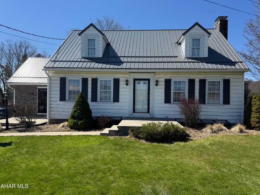 Welcome to 6831 Lincoln Highway where vintage charm converges with todays modern amenities. Step inside the gorgeous den with amazing coffered ceilings, featuring wall to wall built in shelving and file cabinets. Cozy up to the propane fireplace in the spacious living room, complete with wood beamed ceilings. The newly renovated kitchen is a showstopper! Custom made cabinetry, 2 sinks and updated appliances are perfect for the culinary enthusiast. Formal dining room off the kitchen makes entertaining easy.