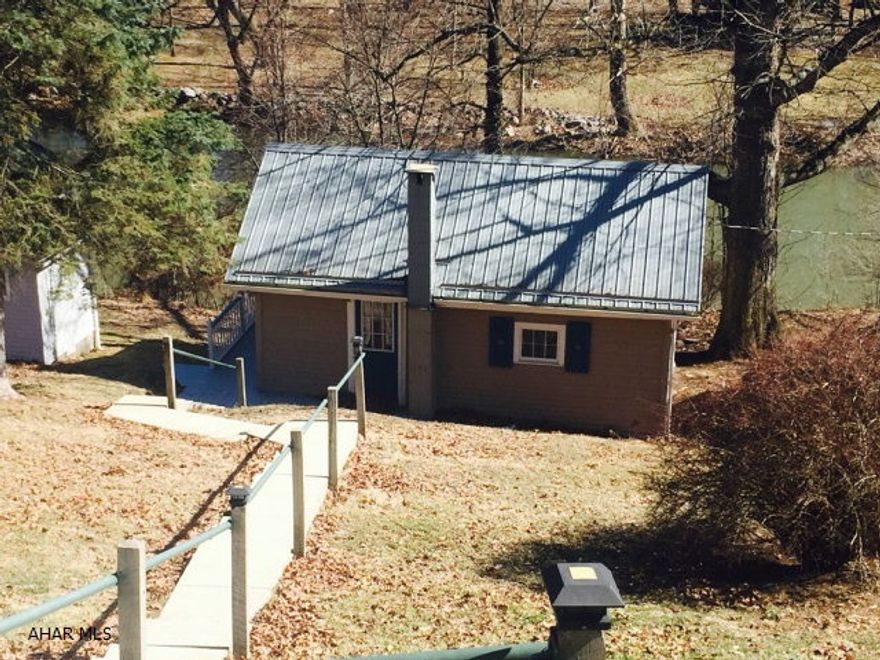 Beautiful well maintained and remodeled river front Cottage.  Come see this gem along the Juniata River with a large patio over the river bank.