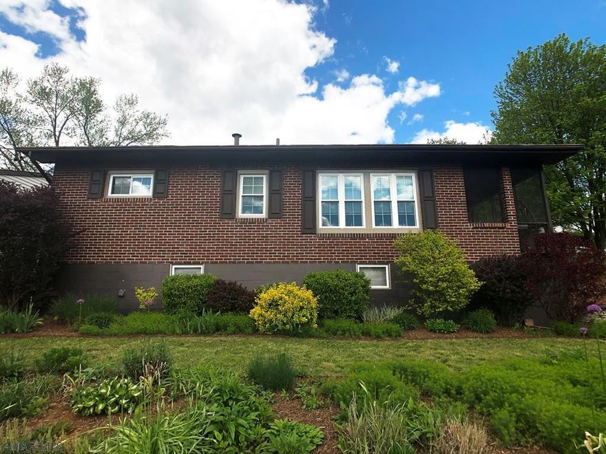 Impressive Raised Ranch in Stonycreek Twp. Move right into this3 bedroom, 1.5 bath, brick/vinyl home with anupdated kitchen and bath. The kitchen has quartz counters, ample cabinet space and a pantry, all open to the dining area. The stunning living room was added in 2004 with beautiful stone work around the gas fireplace and features a wet bar as well as direct access to the patio. Relax in the hot tub and enjoy the beautiful landscapingand privacy. All newer windows. Ask about the transferablewarranty!Vaulted ceilings throughout the entire main floor!Central air, Workshop, and so much more! Call for a tour today!