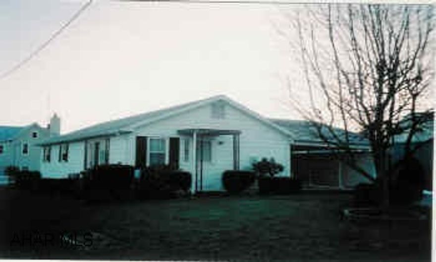 Cozy Ranch with in-town location. Full basement with family room, laundry room, workshop area and storage/ All new appliances included, new screened porch, shed.