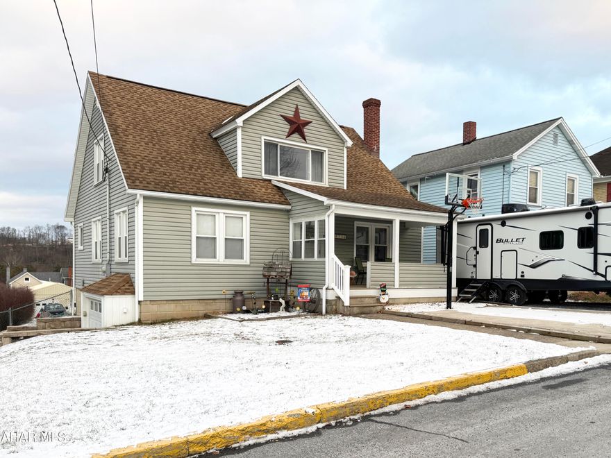 Discover charm and comfort at the corner of West 3rd and Taylor in the heart of trail town Williamsburg! This inviting home offers everything you need—and more. The first floor features gorgeous original wood floors, a spacious living room, cozy dining area, a bright and fresh kitchen, mudroom, first-floor bathroom, and two generously sized bedrooms. The immaculate second level showcases an open-concept living space that leads to a handsome primary bedroom complete with walk-in closet, sitting area, office space, and bathroom. This versatile layout offers endless possibilities to suit your lifestyle. Thoughtful design ensures no space is wasted, with clever built-in cubbies and storage tucked into every nook and cranny. The basement, fit with laundry, kitchen area, bathroom, and separate garage space, gives potential as a workshop for hobbyists, hunters, and crafters or as an awesome game room, home gym, or anything else you can imagine.

Enjoy the convenience of town living while taking in beautiful mountain views, stargazing, or watching seasonal fireworks from your balcony. The added patio area is perfect for backyard barbecues, picnics, and relaxing while soaking in the scenery.
Parking is a breeze with ample street parking along the length of the property, an additional space along the alley, and a parking pad ideal for a camper or trailer. The outdoor space offers even more to love—play in the backyard or shoot hoops on the front-yard basketball court.
Take a short walk to the local schools, library, Riverside Park and Recreation Area, coffee shop and eateries, Lower Trail of Rails to Trails, and Juniata River Trail or venture out for shopping, dining, or more entertainment in Altoona, Raystown, Blue Knob, and State College. This unique property blends character, functionality, and location—don't miss your opportunity to call it home!