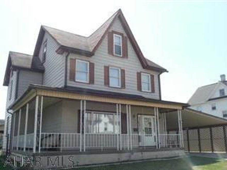 Spacious 4 or 5 bedroom two bath home situated on a large level lot. Wrap around porch on the front and a second floor balcony with great views of the mountains in the back. A large attached carport and also a detached carport off of the alley that cam accommodate a camper or motor home. Large shed with electricity.