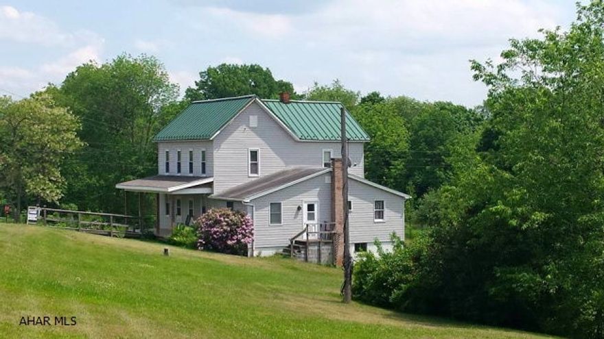 This 5 bedroom, 2 bath historical farmhouse has lots of character. Main floor has two bedrooms and full bath. This home comes with 27 acres of beautiful land with stream. Lovely private rural setting in New Paris PA. House has new roof, new covered front porch, new windows, new kitchen, new bathroom, updated laundry room plus many other updates. The beautiful land includes fields for a farmette and woods for hunting. Also includes a 12 x 24 outbuilding. This would be ideal for horses or cattle; or someone who just wants a hobby farm.