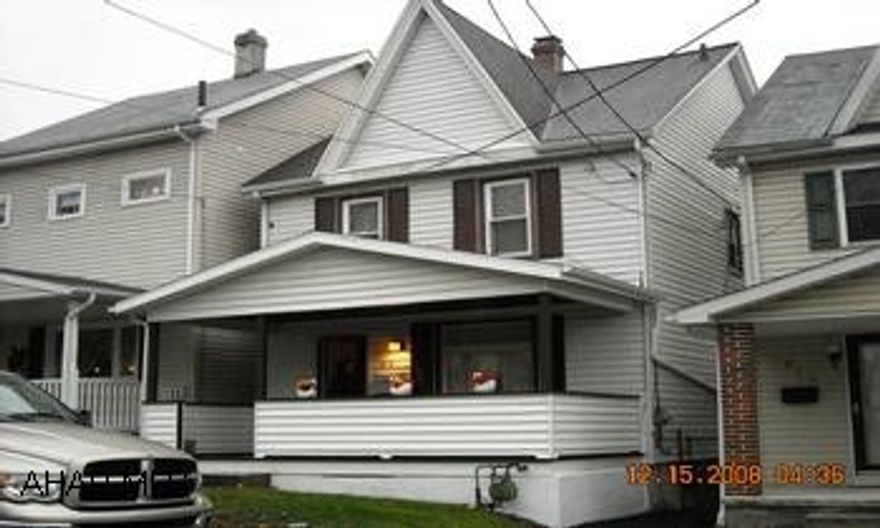 CHARMING 2 STORY HOME WITH MANY UPDATES IN A BEAUTIFUL NEIGHBORHOOD WITH ABOVE GROUND POOL, 3 BEDROOM, 1.75 BATH. REDUCED!  CHARMING AND WELL KEPT 2 STORY HOME WITH NEW ROOF, CARPET, ELEC. SERVICE, WATER LINE AND MORE. HAS MOSTLY REPLACEMENT WINDOWS. LEVEL LOT FENCED WITH ABOVE GROUND POOL AND LOW, LOW TAXES. MIKE MANGIA 932-8888.