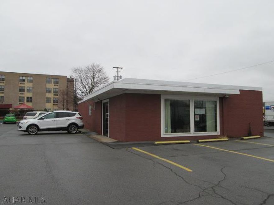 Hollidaysburg. One story commercial building. 1770 sf. Newer flat roof. Building needs new furnace and some electrical repair. The reduced price aids in needed repairs. Property sold "As Is". Access to building from Blair, Spring and Grant Street.