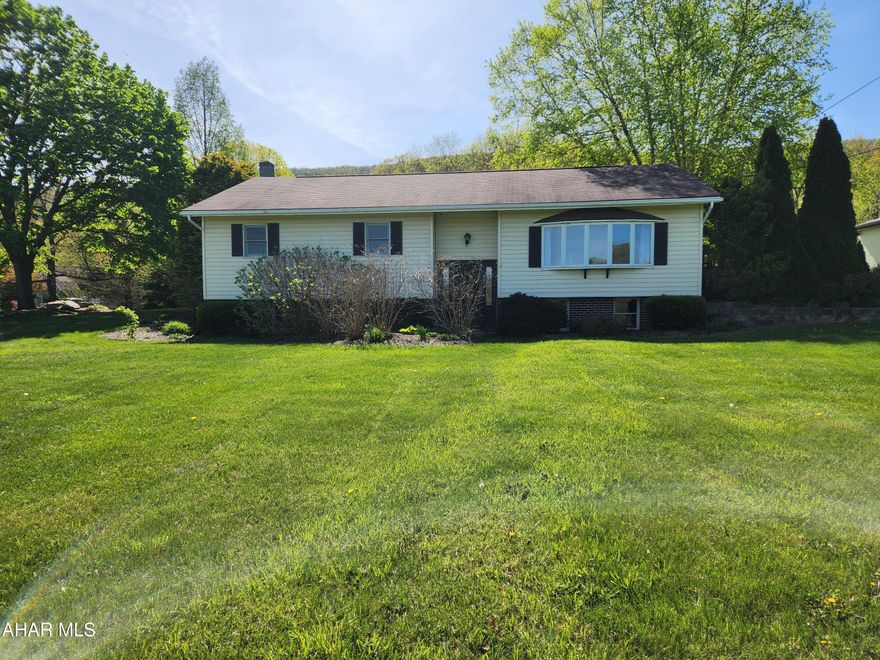 Are you looking for a move-in ready home in the NBC School District?  Then come have a look at this 3 bedroom, 2 bathroom home with a partially finished basement.  With almost 9 acres of land, you'll have plenty of room for outdoor activities. This split entry home has been well-maintained. The living room has a large window for lots of natural light.  The kitchen and dining room is an open concept with lots of cabinet space.  The common bathroom was updated and has ceramic tile flooring.  The primary bedroom features an en suite bathroom with a shower stall.  The basement has been nicely finished.  It features a large family room for entertaining, an office or 4th bedroom and a full bathroom with a ceramic tile shower.  If garages are your thing, you'll like the 40 by 40 garage that is capable of holding an RV on one side and two cars on the other.  There is even a small man cave in the garage.  The side deck is a great place to relax with your morning coffee or to unwind after a long day's work.  The spacious back yard is perfect  for a garden or outdoor activities.  The woods behind the house have trails for hiking or biking or just enjoying nature.  Buyer to verify acreage and square footage.  Aerial map in listing is for reference only.  Seller must find suitable housing.