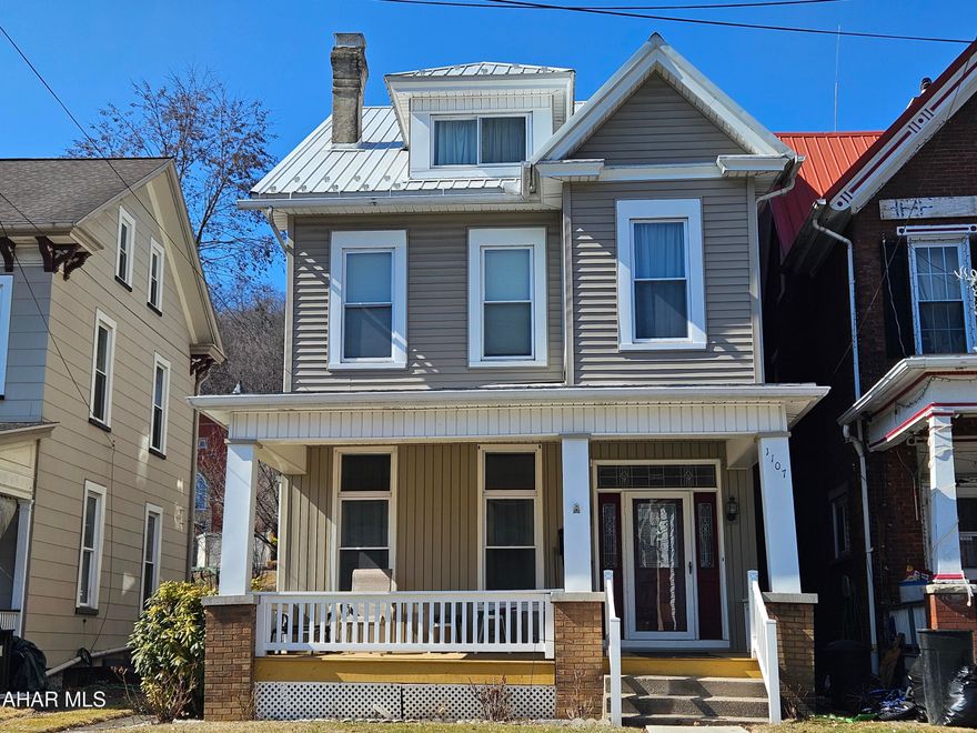 Charming Victorian-era home, seamlessly blending classic character with modern amenities! This three-story residence features five spacious bedrooms, a 3/4 bath on the third floor, convenient main-floor laundry, and a half bath. Generously sized bedrooms and original hardwood floors throughout.  The oversized, bright kitchen offers an abundance of storage space along with plenty of room for a large table in addition to the formal dining room.  Recent updates include a metal roof, newer windows, and updated siding, along with a newer hot water tank.