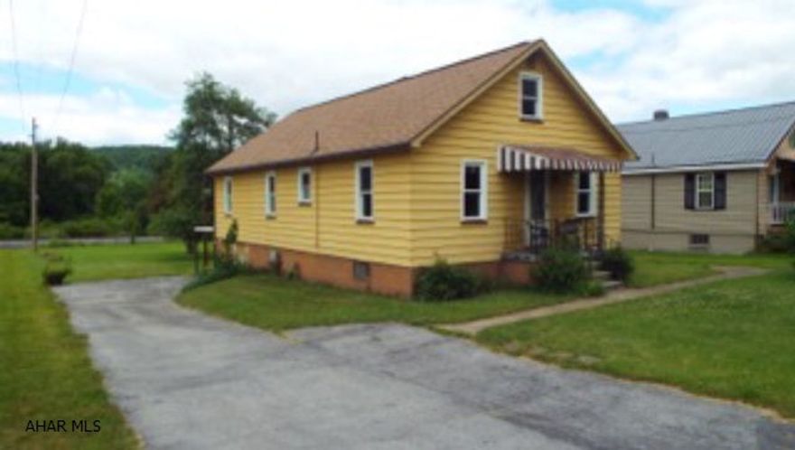 One level living on spacious country lot. Hollidaysburg School District, hardwood floors, new windows, new furnace. Plaster under paneling. Perfect for the first time home buyer or as an investment.