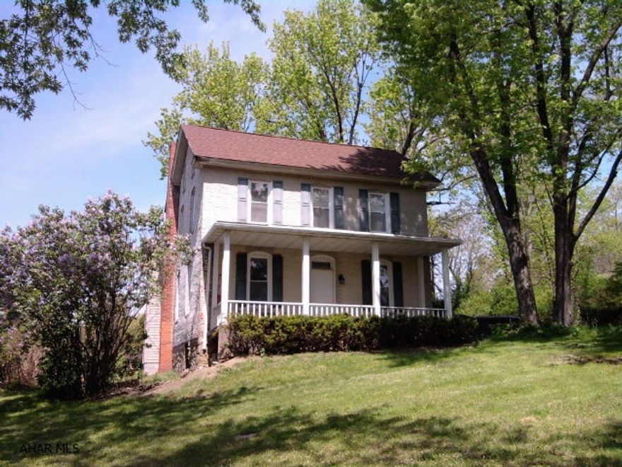 Remodeled 2 1/2 story, 4 bedroom brick and frame home on the outskirts of Bellwood Borough.  Modern kitchen and bathrooms. New oil hot air heating system. Thermopane windows.