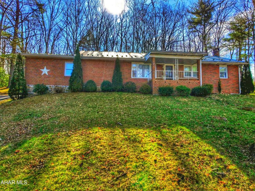 Hard to find one level living Full Brick Ranch Home. Circular paved driveway for easy access in and out. Drive around back to the 2 car garage which has lots of  good space, has pull downsteps to the attic storage. Walk in the back door to the eat-in kitchen. Lovely hardwood flooring in the living room and under carpets in the bedrooms. Laundry hook-ups have been moved to main floor. Basement is finished with family room featuring a gas or wood fireplace, 2nd kitchen and 2nd bathroom area. Bonus room in basement that could have many uses.  Outside enjoy the  large yard with a great view. Heat is oil F/A along with central air. Sellers are fixing /repairing the current septic system to meet SEO specifications.  See disclosure addendum Call today for an appointment to make this your new home!