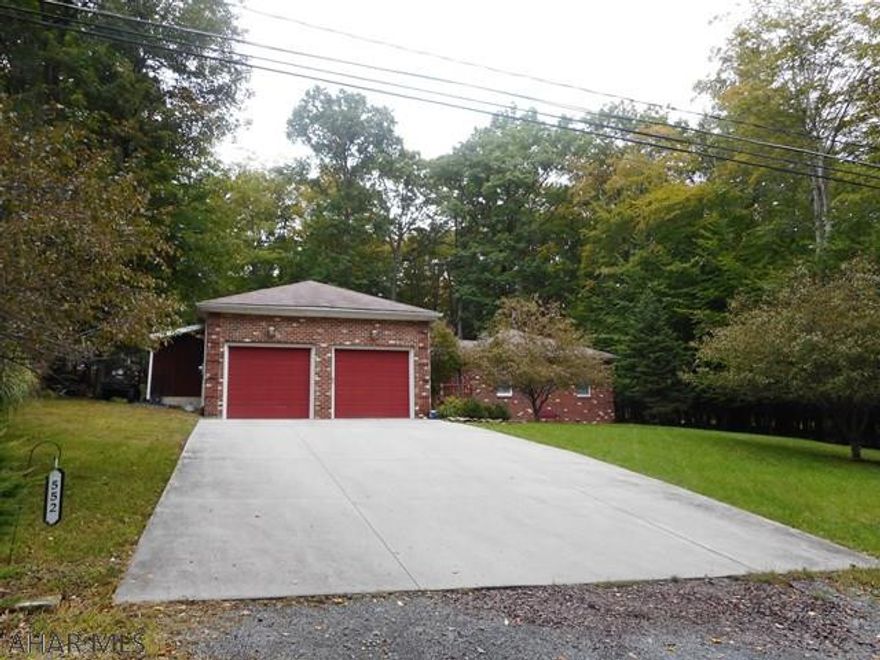 Beautiful brick rancher on a large landscaped lot. Home features equipped kitchen, formal dining room, large living room with fireplace and hardwood floors, 3 bedrooms and two baths. Walk in closet off the master bedroom. Very clean and well maintained home. Concrete drive. Utility shed/kennel. Rear deck with hot tub. Great home for the $$.