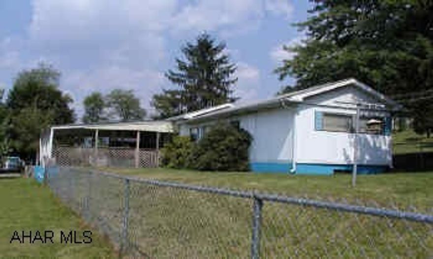1970 single wide mobile home on full foundation.
