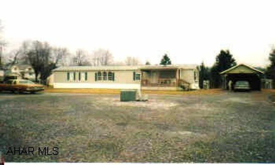 Nice 1996 Colony Mobile home 14x70, 2 bedrooms, 2 baths, central air, wet bar, covered deck, shingle roof, carport.  Owner has $40,000 in this mobile home.  Immaculate!