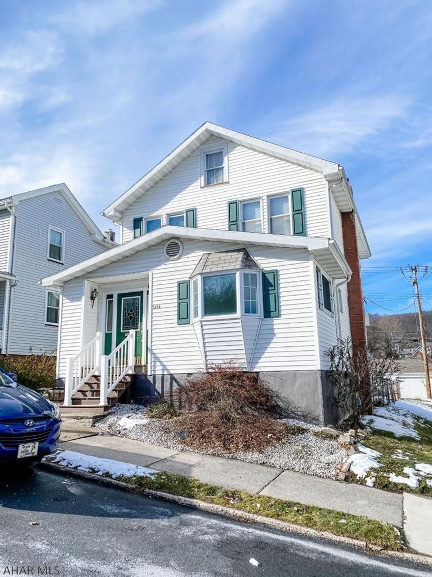 Move-in ready home with plenty of large closet space. Paved area for off-street parking, Half bath/Laundry on first floor with heated floors. Screened in back porch with cable hook-up. Fenced in yard!