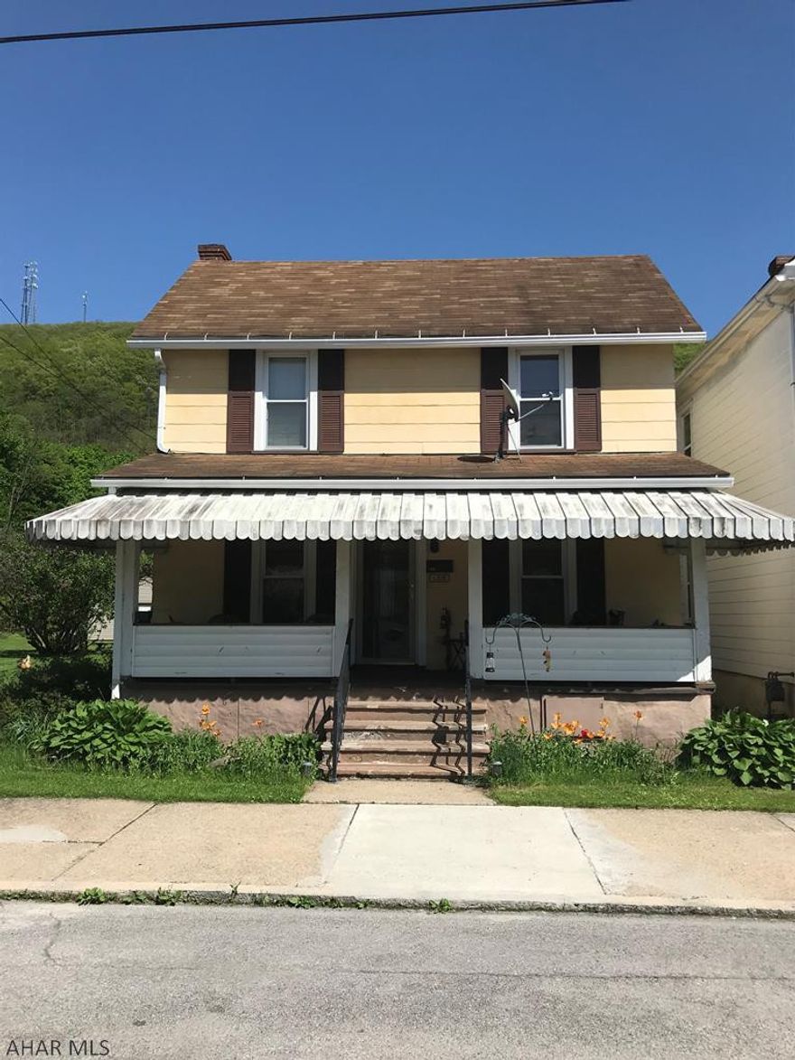 3 bedroom, 1 bath house with a nice front porch and backyard.