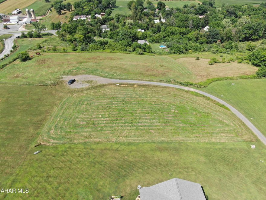 Nice building site offering great views of the surrounding countryside consisting of 1.2217 acres with public sewer and electric available.