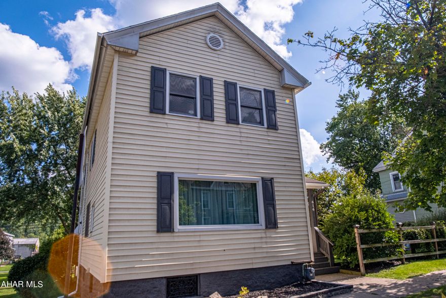 Don't miss out on your chance to own in the Hollidaysburg Borough! This charming 3-bedroom, 2-bathroom residence has been nicely updated to suit your needs. The property offers a spacious primary bedroom on the second level with an ensuite and a walk-in closet. New laminate vinyl plank flooring has been installed in the kitchen, dining room, and bathrooms. 

The spacious kitchen is open to the dining room with large sliding doors that open onto the back deck. Imagine hosting summer barbecues or relaxing by the fire pit on a fall evening. Off-street parking adds an extra layer of convenience, making coming home a breeze. 

Located within the esteemed Hollidaysburg school district, this home is close to parks, shopping, and dining. The property provides the perfect backdrop for your next chapter.

Don't miss the opportunity to make this beautiful house your forever home. Schedule a tour today and experience the magic of living in this home!