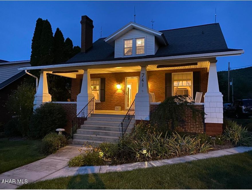 REDUCED!!.....Brick Beauty on Juliana St. the back of lot has a view of the mountains and Elks golf course. Great front porch for sitting and relaxing. Large living room with natural gas fireplace. dining room, kitchen, main floor bedroom or sitting room and full bathroom. 3 bedrooms upstairs,  with a small deck off the 3rd bedroom. Full bathroom and upstairs laundry with 1/2 bath . Mother in law suite on first level , with kitchen, living room, bedroom and full bath. Central air, natural gas heat, oversized one car garage. Many unique features and lots of extras.  Open House Sunday Oct 15th from 1-2:30.