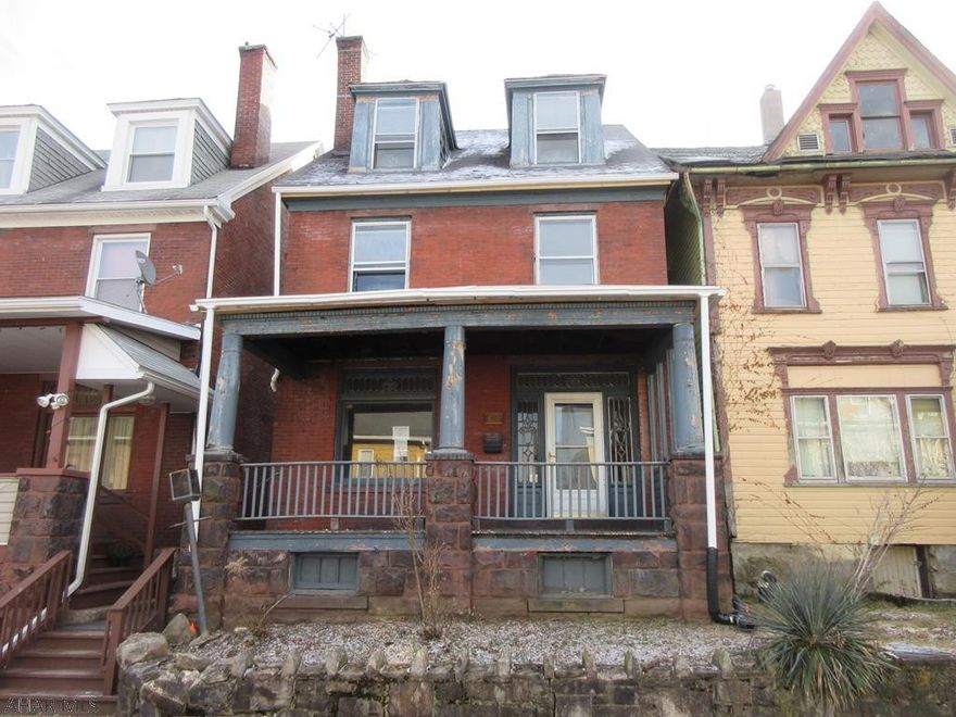 Altoona brick 2 story has lots of charm throughout, but needs some TLC. Living room with beautiful stone FP and formal dining room with leaded glass windows and oak trim throughout. 3 nice sized bedrooms, second floor laundry plus large finished attic that could serve as additional living space. Nice backyard plus solid brick 1 car garage.  Property sold AS-IS. Seller will make no repairs. Offers must be submitted through HUD-approved broker. Buyer pays both transfer taxes. Exclusive Agency. Equal Housing Opportunity. Marketed by Olympus AMS. www.olympusams-re.com. www.HUDHomestore.com.