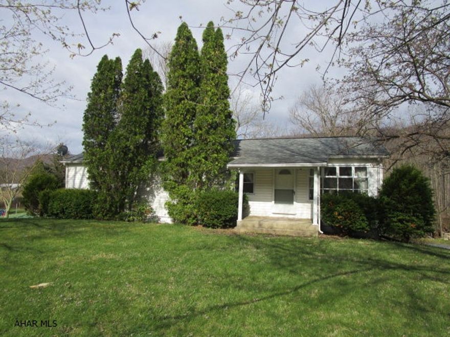 Spacious rancher with many updates. This house offers 3-Bed, LR, Kit, D.A., 1 Bath and Large FR on the first level. Full basement that is partially finished w/Rec Room, Bed, Full Bath and exterior walk-out. Rec Room has a stone hearth with wood burning stove. two-car integral garage, private well, new sand mound septic system, covered front porch and rear deck. Nice, soothing stream passing through the back yard. This is a lot of house for the money!