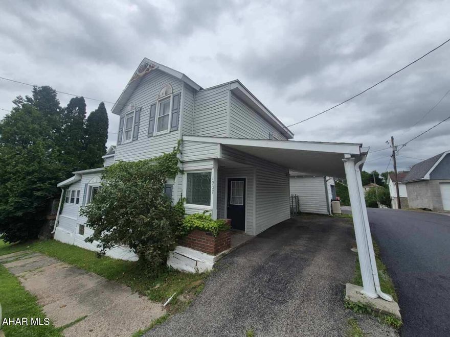 Move in ready! This three bedroom two bath home is ready for a new owner. The main floor offers: kitchen, dining room, living room, first floor laundry, full bathroom, and sunroom. The second floor offers three bedrooms and a full bathroom. The low-maintenance, fenced-in yard makes the outside area a breeze, with a deck perfect for grilling. The carport is convenient for unloading groceries right into the kitchen and provides off-street parking. The current owner just had the home repainted and new carpeting laid.