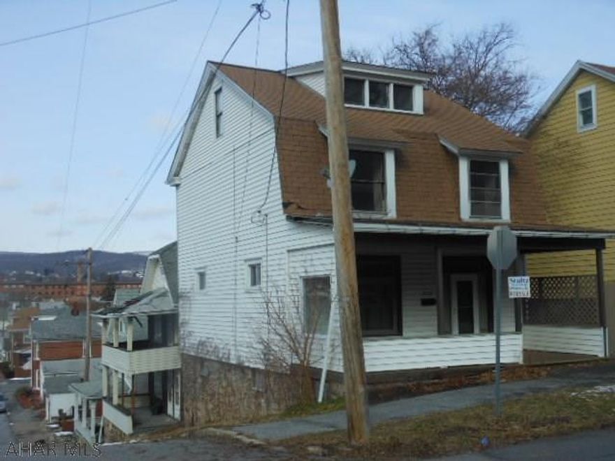 3/4 bedroom home with good rental history. Pretty knee walls with pillars in foyer and living room .  Would also be a great residential home also.   3rd floor is finished but not heated...would be great a great 4th bedroom .Private fenced yard on corner lot.