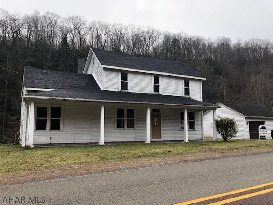 2 story farmhouse style on .56 acres in Fairhope PA.   Stream frontage but the house is not in a flood zone.   Vaulted ceiling in kitchen, nice sized bedrooms, some updates.  House will need TLC and completed repairs to make habitable.  Cash or rehab loan only.