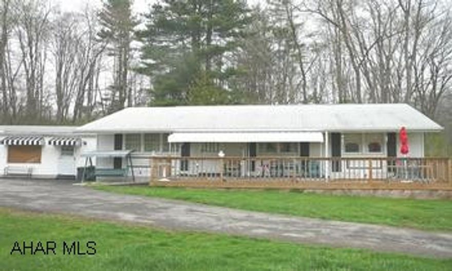 LOWER LEVEL IS LARGE AND OPEN; HAS PELLET STOVE, U.V. LIGHT INSTALLED, COUNTRY SETTING, NEW HOT WATER HEATER.