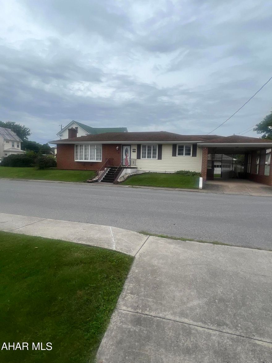 Three bedroom ranch on corner lot. Open floor plan with fireplace in Living Room.  Basement has 1/2 Bath, storage and could be finished for additional living space.