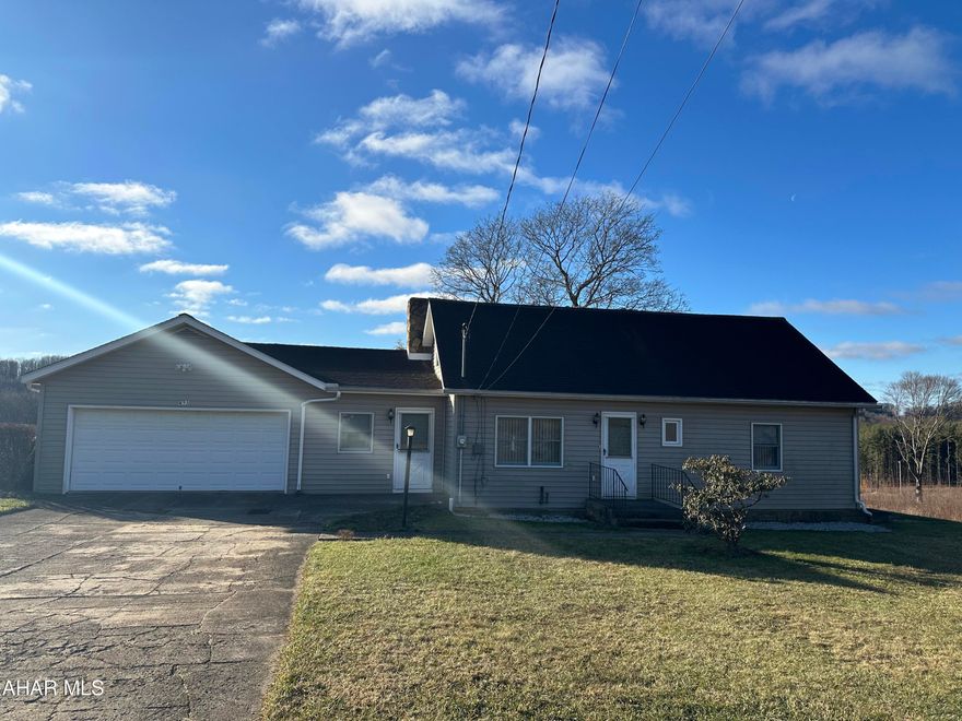 Wonderful opportunity  for 3 bedroom home in the country situated on  on approx 0.8 acres. Park your vehicles or toys in the 2 car attached garage. Features include convenient breezeway with laundry that leads from the garage to the eat in kitchen. There are two first floor bedrooms and a third bedroom and game room on the second floor.  Seller recently installed new sandbed for septic and upgraded drainage in basement.  Call for details!