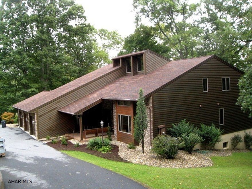 This could be your dream house! Beautiful contemporary brick and cedar home. Located on a cul-de-sac in a quiet neighborhood overlooking Bedford. Very spacious w/ many amenities. Large decks, 2 new heat pumps, 2 fireplaces, large finished bsmt, main floor master bedroom.