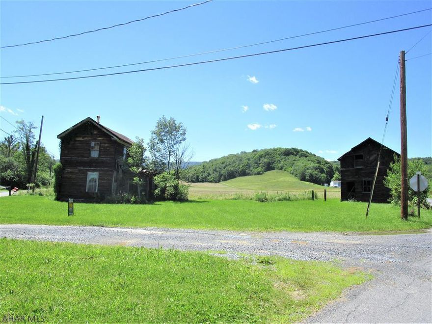 Flat, open land with public road frontage along Dunkard Hollow Rd./SR 4024 & Wissinger Rd. / T. 563  Public sewer is currently available via C.R.A.J.M.A.(623-9009); tap fees & all costs to connect at buyer's expense.    Buyer responsible for drilling well (public water not available).          ACREAGE APPROXIMATE - THERE MAY BE OR MAY NOT BE ADDITIONAL DEEDS.    C.R.A.J.M.A. EASEMENT RECORDED IN BOOK 1013 / P.  762...     ESTATE SALE.  "OTHER":  PLEASE NOTE THERE MAY BE A SEPTIC OR HOLDING TANK & AN OLD WELL OR CISTERN ON PROPERTY - CAUTION IS ADVISED.   OLD HOUSE & BARN HAVE NOT BEEN OCCUPIED FOR 30+YEARS; UNSAFE - DO NOT ATTEMPT ACCESS THESE BUILDINGS.