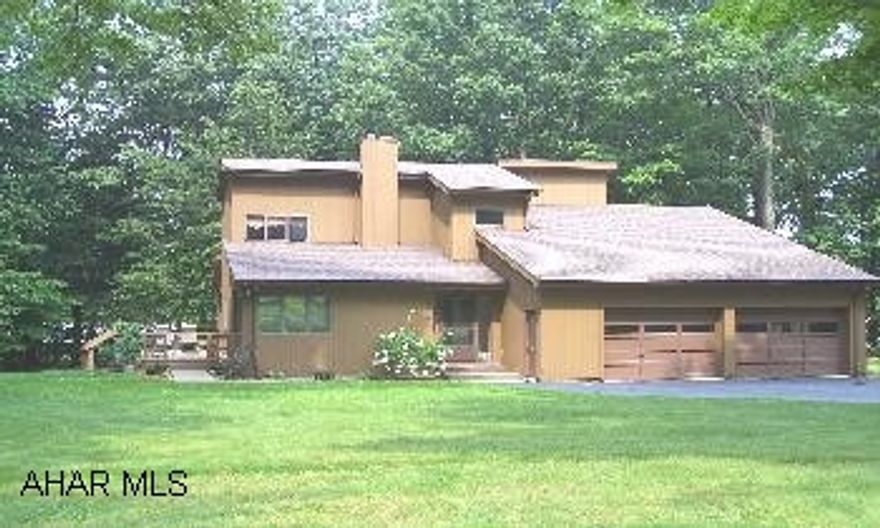 LOVELY CONTEMP. HOME SITUATED ON A WOODED, PRIVATE LOT.  BASEMENT STUDDED OUT FOR F.R. ADDITIONAL LOT CAN BE PURCHASED FOR $48,000(150x150).