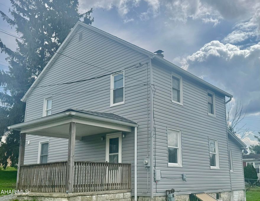 Are you looking for a home with additional income available?   This home is exactly what you are looking for.  The 14 unit, fully rented storage units produce added income.  10 of the storage units measure 10 x 20.  The other 4 are 10 x 10.  Inside the home you will find a large eat in kitchen, large living room, and 2 bedrooms upstairs with a bonus room that could be used as a third bedroom.  This property sits right off of Admiral Peary Highway, conveniently located to the shops and businesses in Cresson.   Roof, siding, and furnace were all replaced within the past five years.  Set up an appointment today to see all this wonderful property has to offer!