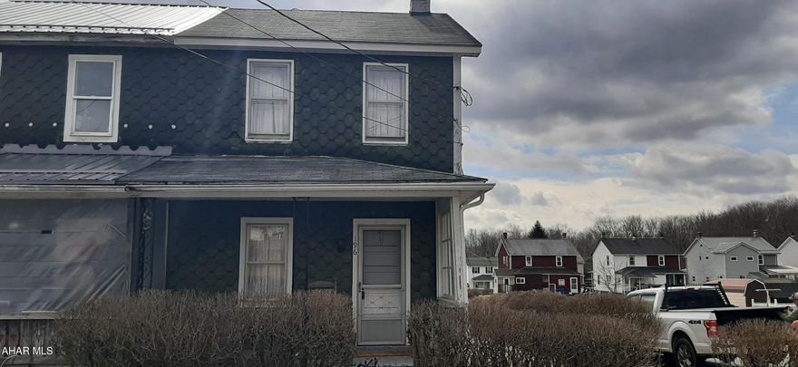 Welcome to your next project! This duplex at 196 Wood Ave is priced to sell for your next investment property or remodel for your own! This home offers a great sized living room, eat in kitchen,and enclosed back porch. The second level offers two large bedrooms and a walk up to the attic space for plenty of storage. The basement houses the laundry hook ups and unfortunately the only bathroom facility. The furnace , hot water tank and electrical has been updated. If you are looking for a spring project, this is it!! Call for you showing today!