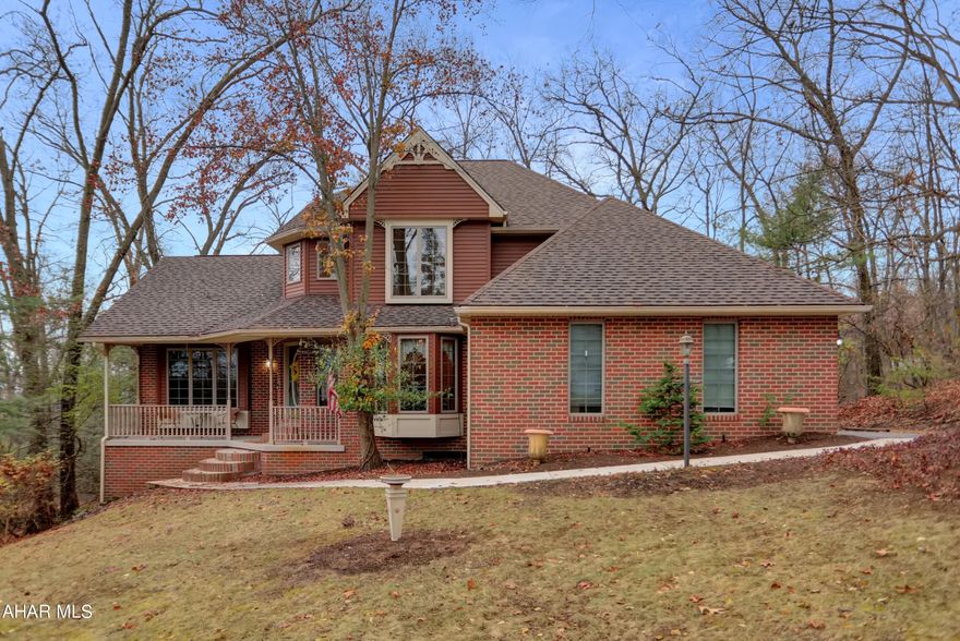 This is not your cookie cutter home! It's a one-of-a-kind, lovingly maintained Victorian style home that's perfectly situated on a seasonally private wooded lot at the end of a cul-de-sac of lovely homes.  It offers a main floor primary bedroom with ensuite featuring dual sinks, jacuzzi tub, shower and walk-in closet.  There's a spacious great room with vaulted ceiling and a beautiful gas fireplace that is sure to be a gathering place for friends and family. From this room you can step out onto the deck to enjoy the peaceful view. There's an amazing kitchen with cherry cabinets, center island and a spacious eating area all with hardwood floors, full of natural light. Additional main floor features are laundry with a utility sink and a brand new washer/dryer, ½ bath, formal dining room with bay window and a stunning 2-story foyer. The second floor offers 3 additional spacious bedrooms with oversized, lighted closets and a full bath. The lower level is finished for additional living space with another full bath and 2 walkouts to the patio and back yard. There's also a 2 car garage, outdoor sprinkler system, and a new well pump, wiring and tank. With all the natural light from the many windows and skylights plus loads of storage space this lovely home is sure to please! Schedule a private showing to see the amazing features of this truly unique home. It's bright, clean and move-in ready just waiting for you to make it your own.