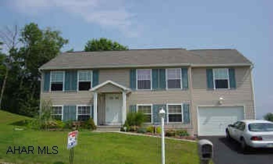 1998 Bi-Level, 5 Bedrooms, 2 Baths, Family Room, Hardwood Floors.  S